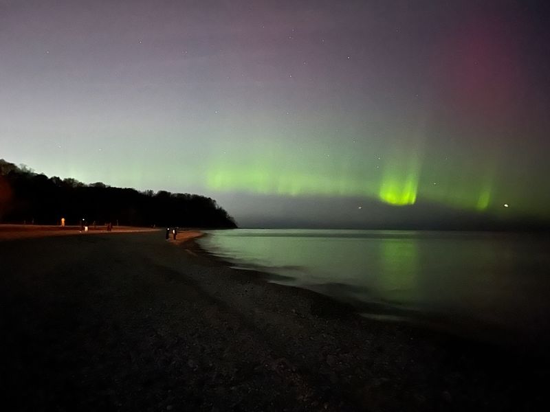 Northern Lights appear over Lake Michigan and Grant Park Beach in South Milwaukee around 9 p.m. on November 12, 2025.
