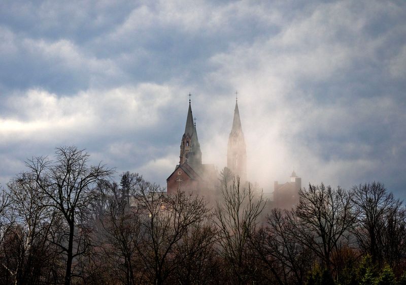 Storm clouds surround Holy Hill Basilica and National Shrine of Mary Help of Christians in Hubertus on April 18, 2025.