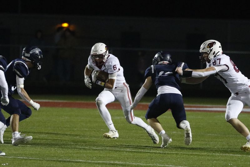 Mayville's Tanner Schneider on a rushing attempt against Lake Country Lutheran at Slinger High School on Friday, Nov. 14. Mayville beat Lake Country Lutheran 27-15 in the Division 5 state semifinals.