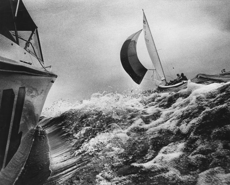 Strong wind and choppy waves were a challenge for Lightning sailor Mike Haggerty off the Milwaukee Yatch Club shore in August, 1971.