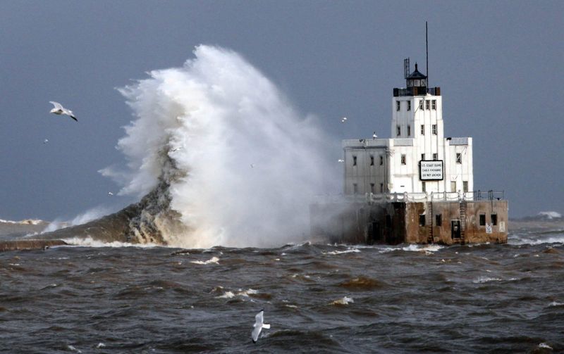 Lake Michigan waves pummel Milwaukee's breakwater lighthouse on December 12, 2010.