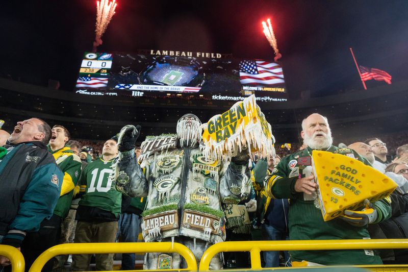 Jeff Kahlow, AKA the Frozen Tundra Man, stands for the National Anthem before the Green Bay Packers game against the Philadelphia Eagles Monday, November 10, 2025 at Lambeau Field in Green Bay, Wisconsin.



Mark Hoffman/Milwaukee Journal Sentinel