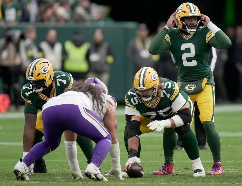 Green Bay Packers quarterback Malik Willis makes an adjustment at the line during the fourth quarter of their game Nov. 23 at Lambeau Field in Green Bay. The Packers beat the Vikings 23-6.