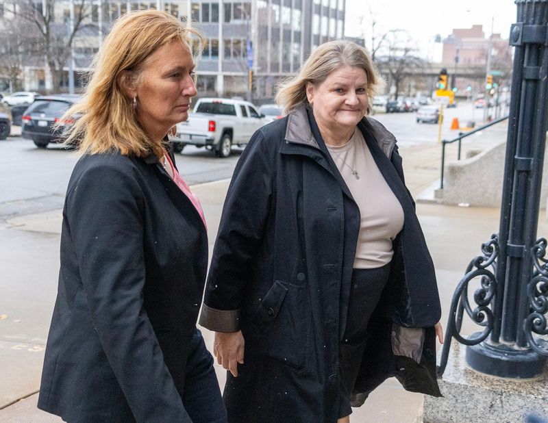 Judge Hannah Dugan (right) enters the Milwaukee Federal Building and U.S. Courthouse in Milwaukee, Wisconsin on Nov. 26, 2025. - Mike De Sisti / Milwaukee Journal Sentinel