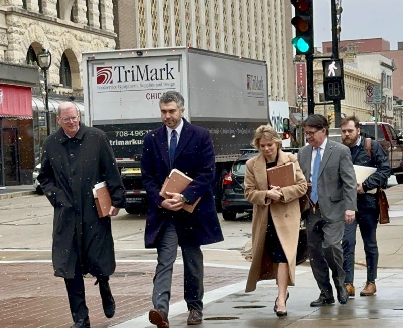 Members of Judge Hannah Dugan's legal team arrive for the final pretrial hearing Nov. 26. From left are Steve Biskupic, Jason Luczak, Nicole Masnica, Dean Strang and Rick Resch.