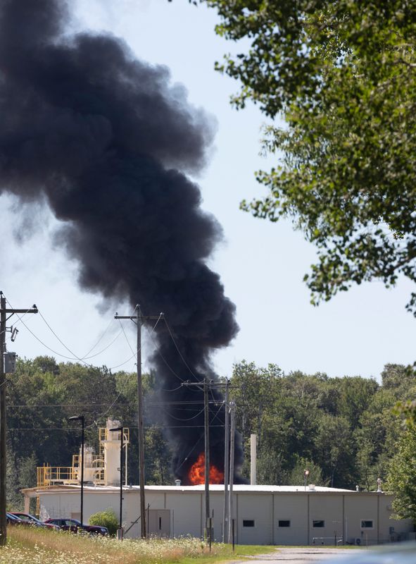A fire and its smoke plume is shown at Tyco Fire Products Tuesday, August 11, 2020 at 2700 Industrial Pkwy S. in Marinette, Wis. The company is a unit of Glendale-based Johnson Controls. The company is providing about 100 areas homeowners with bottled water after elevated levels of "forever chemicals" were detected in their private drinking wells. PFAS are called "forever chemicals" because of their difficulty to break down in the environment. The substances can repel both oil and water and have been used for decades in products like stain-resistant fabrics, nonstick cookware and firefighting foam.