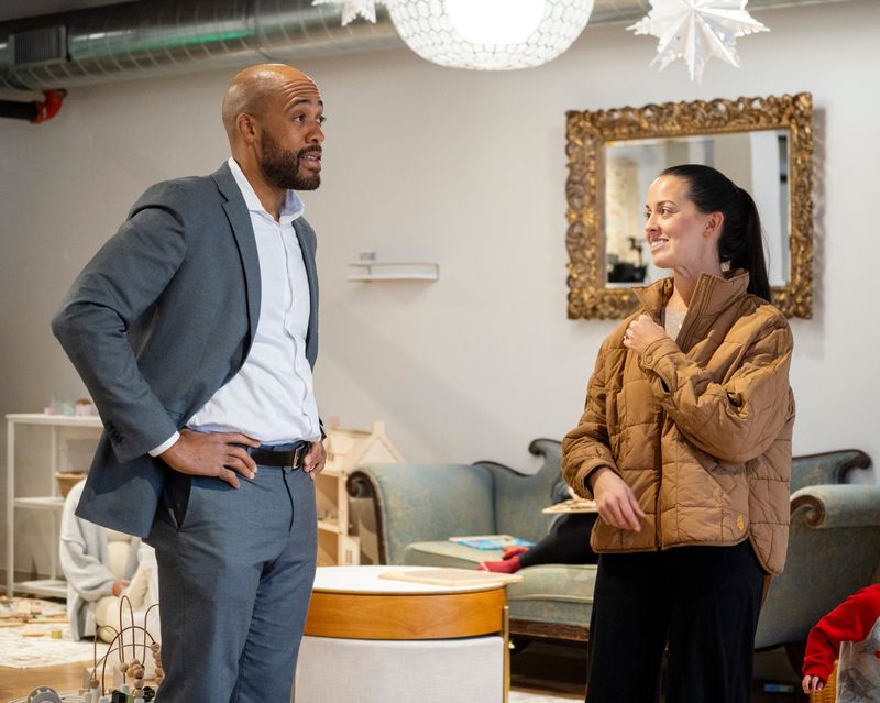 Gubernatorial candidate Mandela Barnes, left, a former Wisconsin lieutenant governor, speaks with Alexis Sover, right, during the first stop of his “Wisconsin Way” tour, where he met with local mothers to discuss challenges facing families, on Dec. 3, 2025, at Little Village Play Cafe in Wauwatosa, Wisconsin.