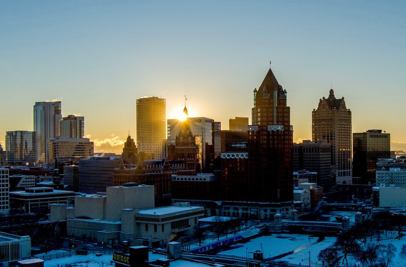 The sun rises over a cold Milwaukee, Wisconsin skyline on Dec. 4, 2025. Temperatures will rebound a bit by Friday, Dec. 5, with highs in the low 20s.