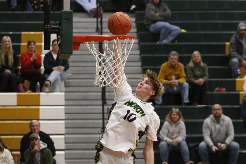 Oshkosh North's Bryce Ott dunks the ball against Kimberly at Oshkosh North High School on Friday, Dec. 5, 2025. Kimberly beat Oshkosh North, 62-61.