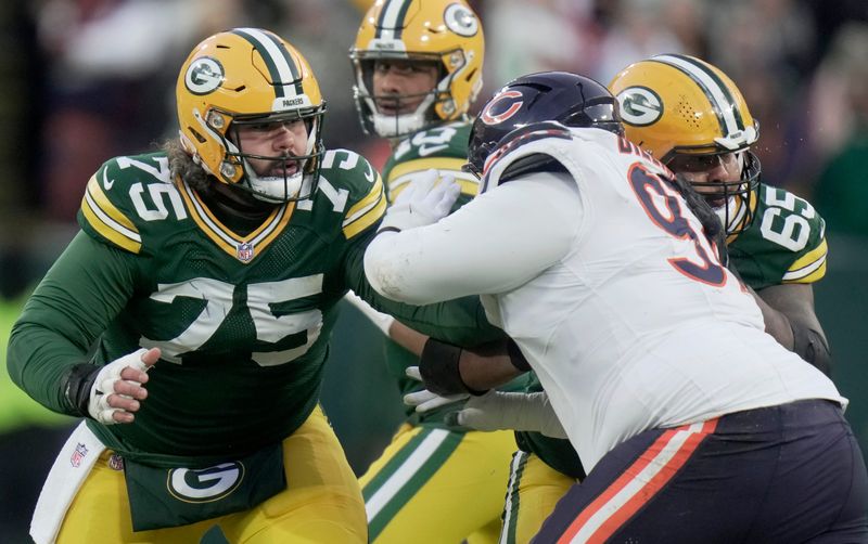 Green Bay Packers center Sean Rhyan blocks Chicago Bears defensive tackle Andrew Billings.