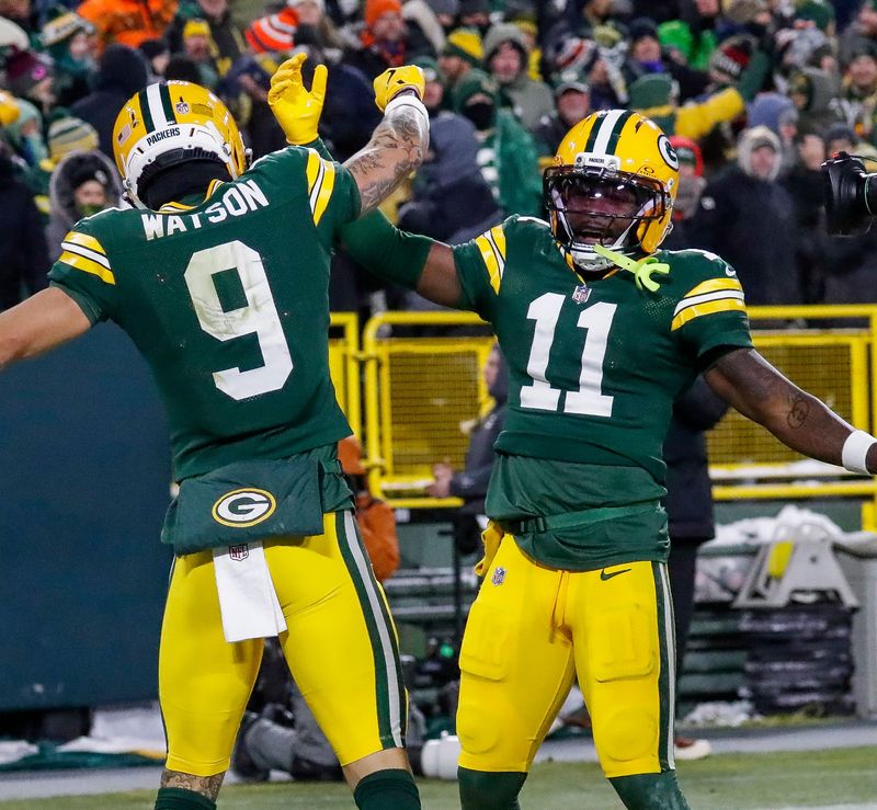 Green Bay Packers wide receiver Christian Watson (9) and wide receiver Jayden Reed celebrate after Watson scores a touchdown against the Chicago Bears on Sunday, December 7, 2025, at Lambeau Field in Green Bay, Wis. The Packers won the game, 28-21.
Tork Mason/USA TODAY NETWORK-Wisconsin
