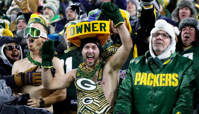Green Bay Packers fans cheer during a football game against the Chicago Bears on Dec. 7, 2025, at Lambeau Field in Green Bay, Wis. The Packers defeated the Bears 28-21.