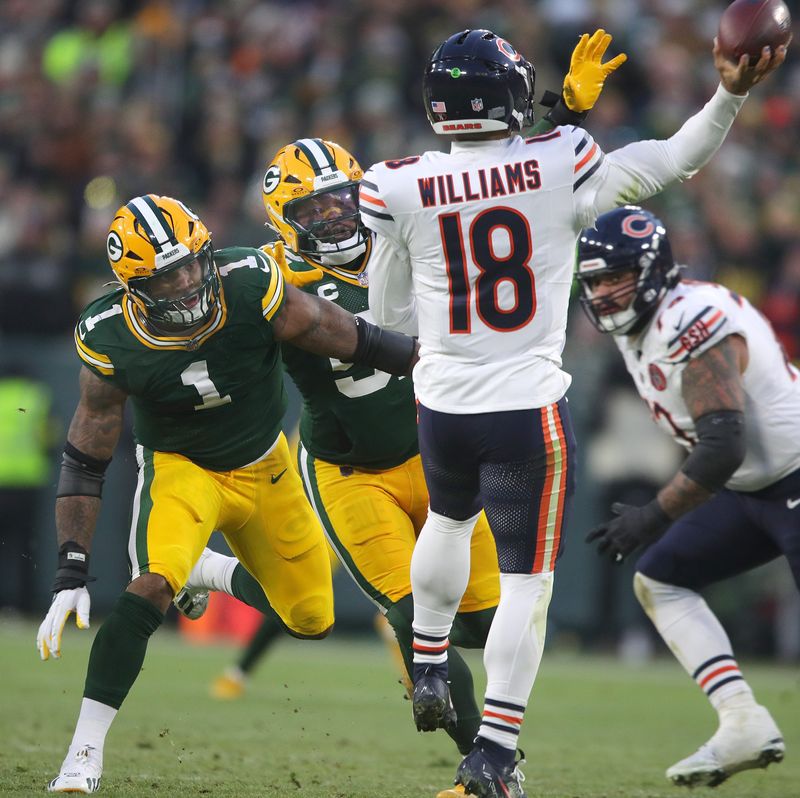 Green Bay Packers defensive end Micah Parsons (1) and defensive end Rashan Gary (52) pressure Chicago Bears quarterback Caleb Williams (18) on Sunday, December 7, 2025, at Lambeau Field in Green Bay, Wis. The Packers defeated the Bears 28-21.
Wm. Glasheen USA TODAY NETWORK-Wisconsin