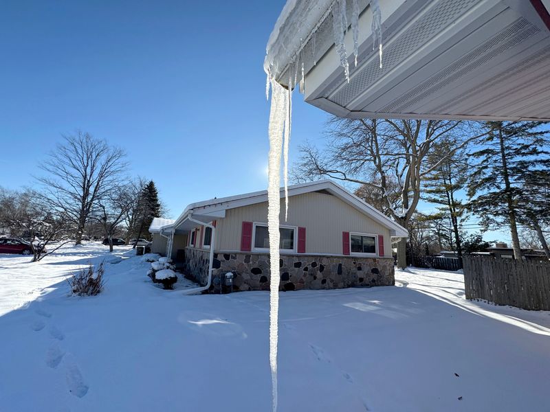 A large icicle hangs from a home in Bayside on Sunday, Dec. 7, 2025.