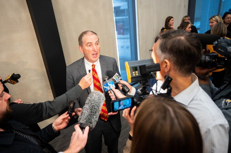 Iowa State athletic director Jamie Pollard takes questions from the media after the introduction of Jimmy Rogers as Iowa State’s new head football coach on Dec. 8, 2025, at Iowa State University in Ames, IA.