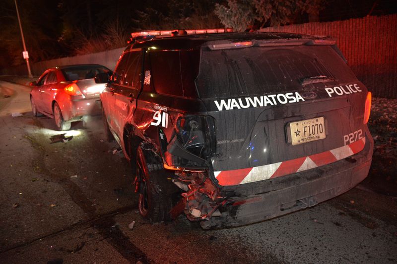 The driver of a ride-share vehicle crashed into a Wauwatosa squad car while the officer was conducting a traffic stop on N. Mayfair Road on Dec. 7. The crash sent two ride share passengers to a hospital with non-life-threatening injuries and left the squad car with significant damage.