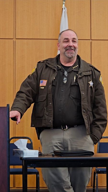 Sheriff Mike Lukas shared his endorsement of Portage County Board chairperson Ray Reser's campaign for Portage County Executive in the Pinery Room at the Stevens Point branch of the Portage County Library on Dec. 11, 2025.