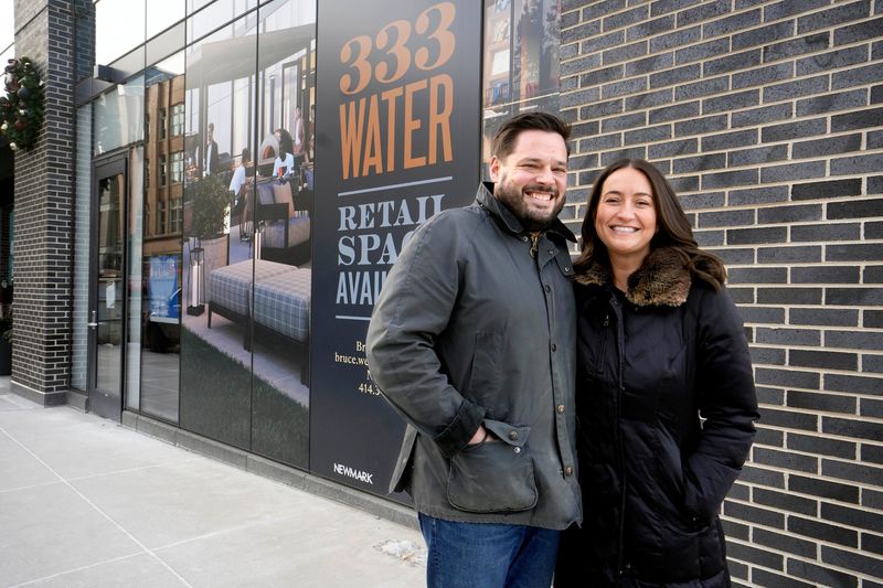 Kyle and Meghan Knall stand outside their new restaurant, Cassis, at 333 N. Water St. on Dec. 15, 2025. The new French bistro from the owners of Birch is set to open Jan. 5, 2026.