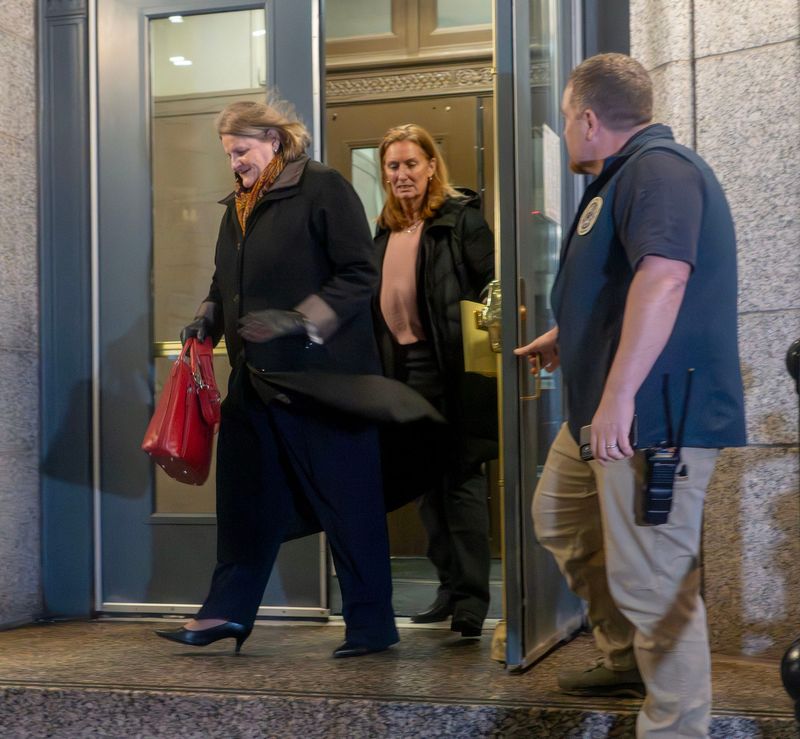 Milwaukee County Judge Hannah Dugan (left) leaves the Milwaukee Federal Building and U.S. Courthouse after the second day of her federal obstruction case in Milwaukee, Wisconsin on Dec. 16, 2025.