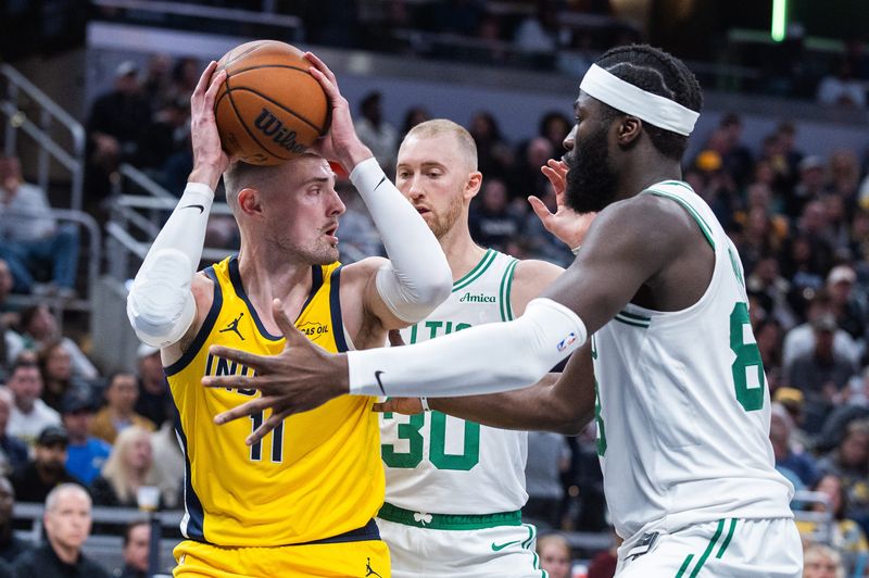Dec 26, 2025; Indianapolis, Indiana, USA; Indiana Pacers center Micah Potter (11) shoots the ball while Boston Celtics center Neemias Queta (88) defends in the first half at Gainbridge Fieldhouse. Mandatory Credit: Trevor Ruszkowski-Imagn Images