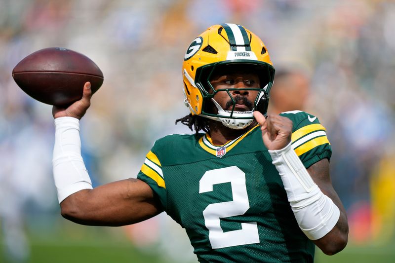 Sep 7, 2025; Green Bay, Wisconsin, USA; Green Bay Packers quarterback Malik Willis (2) warms up before the game against the Detroit Lions at Lambeau Field. Mandatory Credit: Jeff Hanisch-Imagn Images
