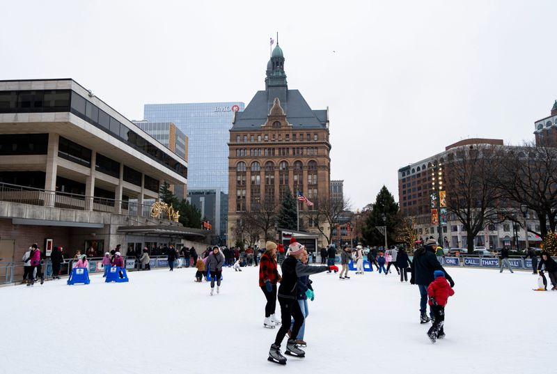 Families skate around the ice rink at Red Arrow Park on Saturday, December 27, 2025 in Milwaukee, Wisconsin.