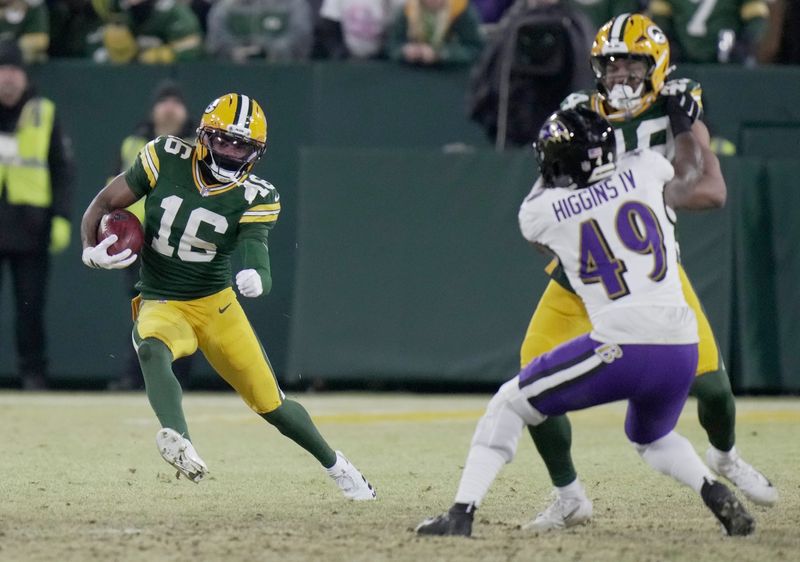 Green Bay Packers cornerback Bo Melton (16) returns a kickoff during the fourth quarter of their game Saturday, December 27, 2025 at Lambeau Field in Green Bay, Wisconsin. The Baltimore Ravens beat the Green Bay Packers 41-24.