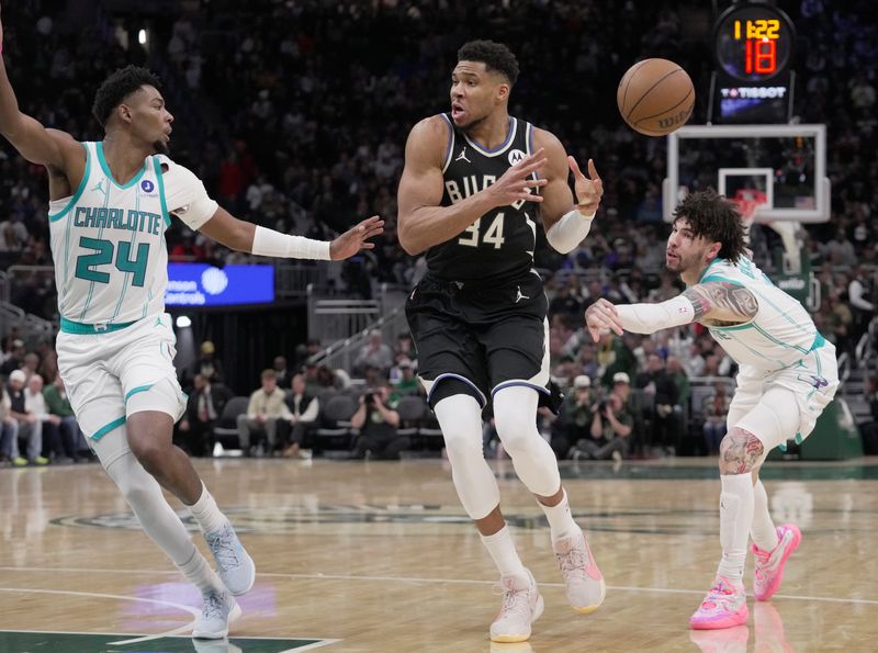 Milwaukee Bucks forward Giannis Antetokounmpo (34) loses the ball after it was swatted by Charlotte Hornets guard Lamelo Ball (1) during the second half of their game Friday, January 2, 2026 at Fiserv Forum in Milwaukee, Wisconsin. The Milwaukee Bucks beat the Charlotte Hornets 122-121.