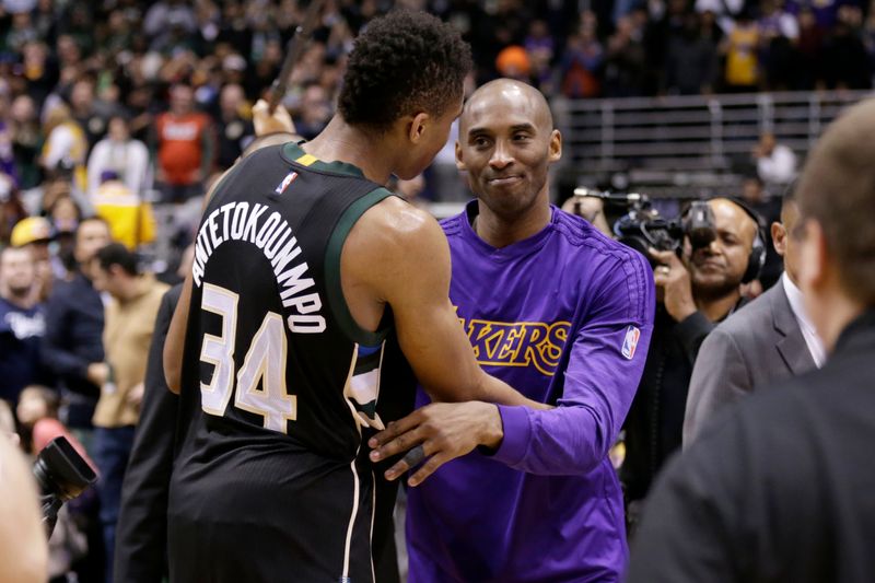 Kobe Bryant of the Los Angeles Lakers hugs Giannis Antetokounmpo of the Milwaukee Bucks after a 2016 game.
