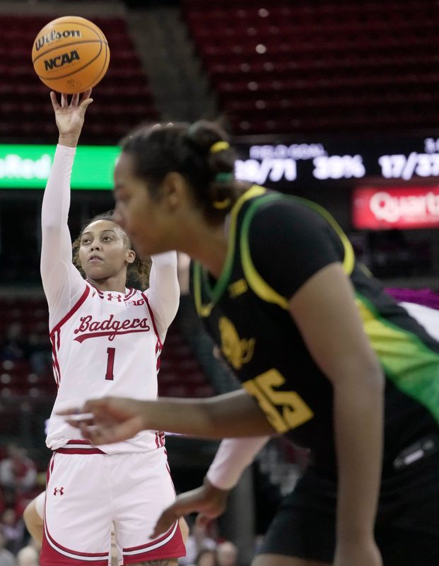 Wisconsin guard Destiny Howell (1) makes a free throw during overtime of their game Sunday, January 18, 2026 at the Kohl Center in Madison, Wisconsin. Wisconsin beat Oregon 96-94 in double overtime.