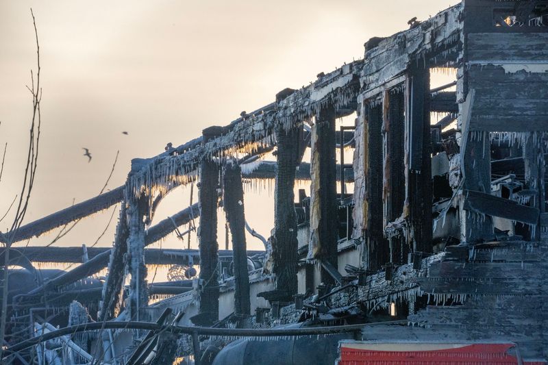 A U-Haul storage facility that caught fire on January 21 still smolders on South 1st Street in Walkers Point in Milwaukee, Wisconsin on Jan. 22, 2026.