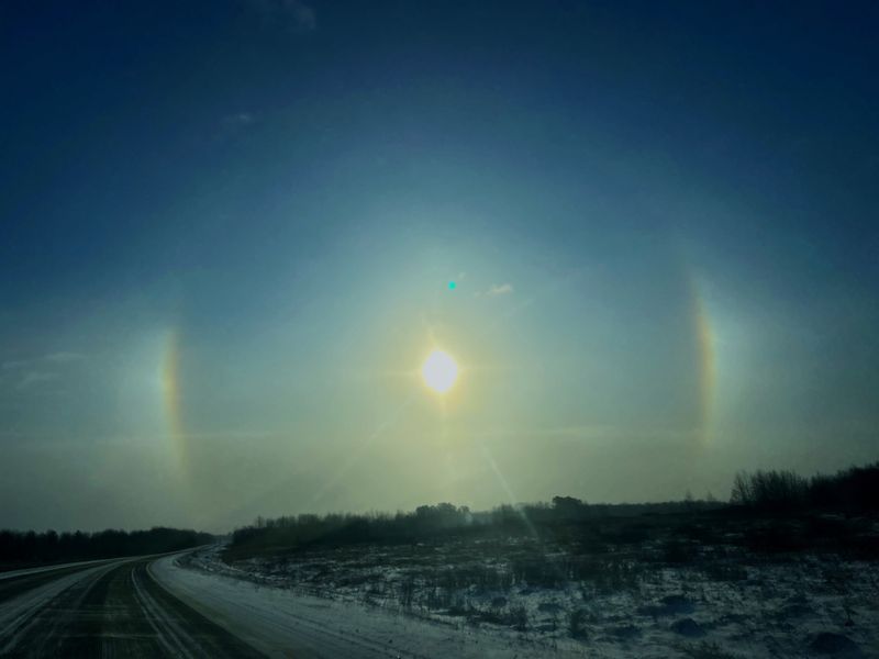 A sun dog seen on Thursday, Jan. 22, 2026, near Pittsville, Wisconsin. Sun dogs are caused by refraction of sunlight by ice crystals.