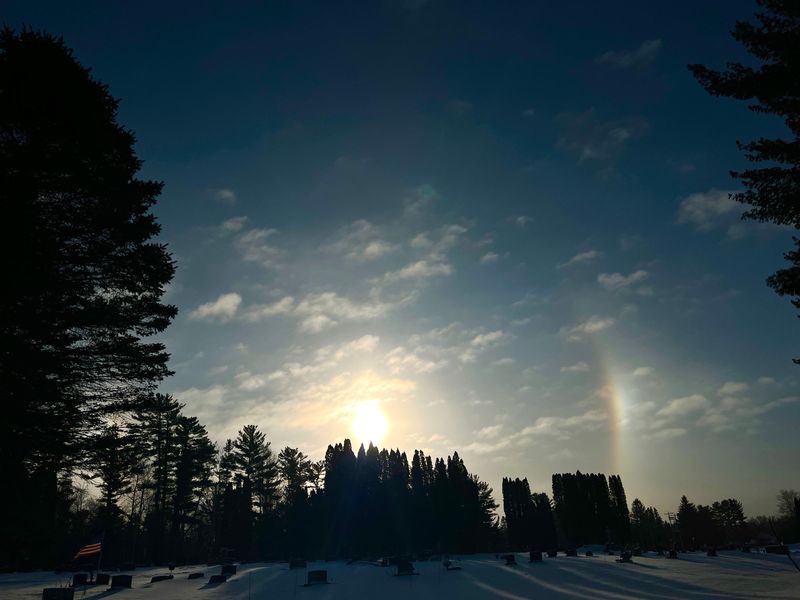A sun dog seen Thursday, Jan. 22, 2026, in Pittsville, Wisconsin. Sun dogs are caused by refraction of sunlight by ice crystals.