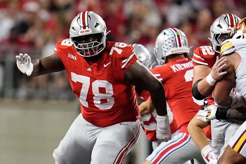 Ohio State Buckeyes offensive lineman Ethan Onianwa (78) blocks during the NCAA football game against the Minnesota Golden Gophers at Ohio Stadium in Columbus on Oct. 4, 2025.