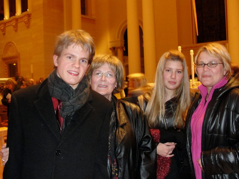 Carrie Zettel, right, with daughter, son, and mom in 2009 at a church.