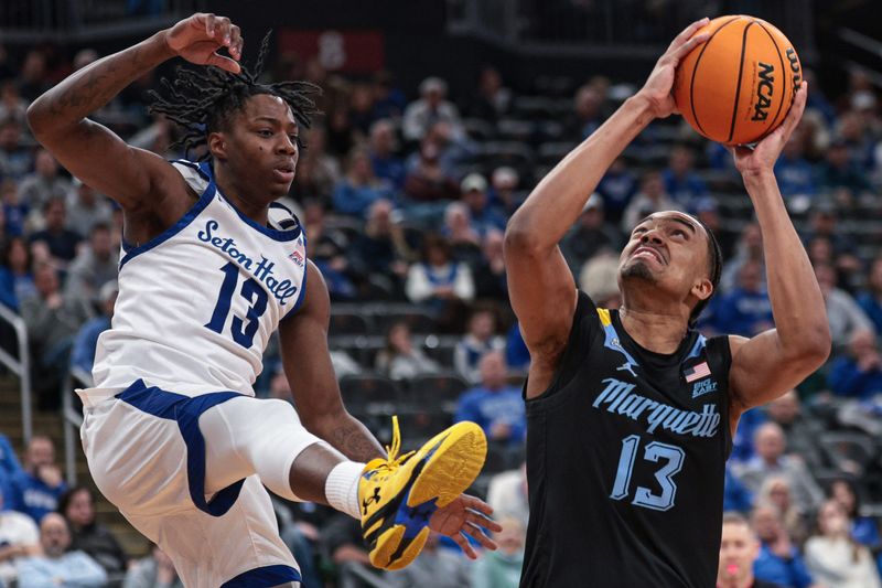 Marquette forward Royce Parham looks to the basket against Seton Hall guard Trey Parkerduring their game Jan. 31 at Prudential Center.