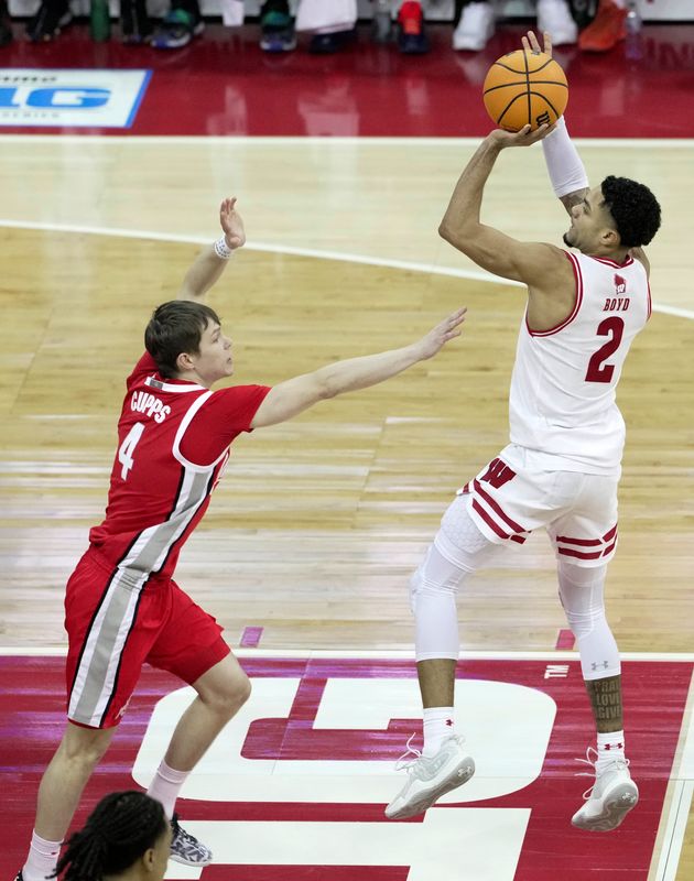 Wisconsin guard Nick Boyd (2) scores on Ohio State guard Gabe Cupps (4) during the first half of their game Saturday, January 31, 2026 at the Kohl Center in Madison, Wisconsin.



Mark Hoffman/Milwaukee Journal Sentinel