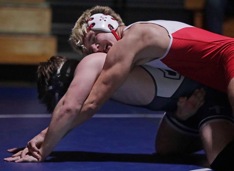 Xavier High School’s Alexander Marg against Seymour High School’s Charlie Gilbertson during their 190 pound wrestling match in Appleton, Wisconsin on Thursday, February 5, 2026. Seymour defeated Xavier 52-18..
Wm. Glasheen /USA TODAY NETWORK-Wisconsin