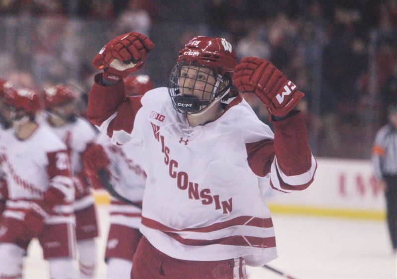 Wisconsins's Quinn Finley celebrates after scoring the game-winning goal in a 6-5 overtime victory over Notre Dame Friday Feb. 6, 2026 at the Kohl Center in Madison, Wis.
