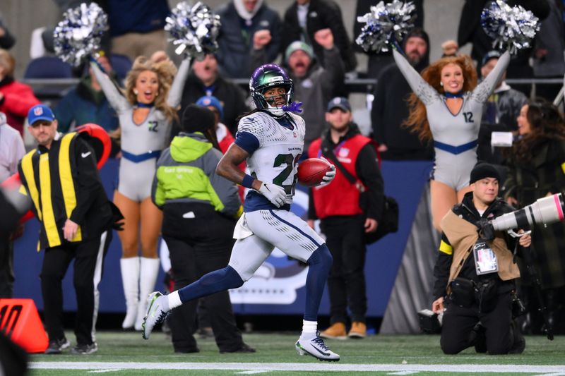Dec 18, 2025; Seattle, Washington, USA; Seattle Seahawks wide receiver Rashid Shaheed (22) returns a punt for a touchdown against the Los Angeles Rams in the second half at Lumen Field. Mandatory Credit: Steven Bisig-Imagn Images