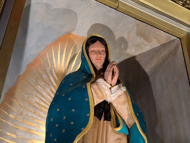 Close-up photo of the "Madre Peregrina" statue, a life-sized statue of the Virgin Mary, in Des Plaines, Illinois. The statue visited Illinois on its international tour, before making its way to Wisconsin.