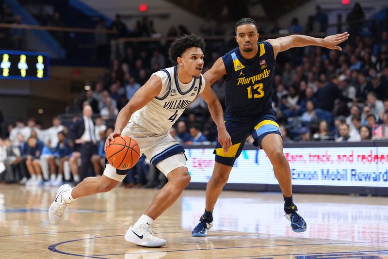 Villanova guard Tyler Perkins drives against Marquette forward Royce Parham in the first half of their game Feb. 10 at Finneran Pavilion.