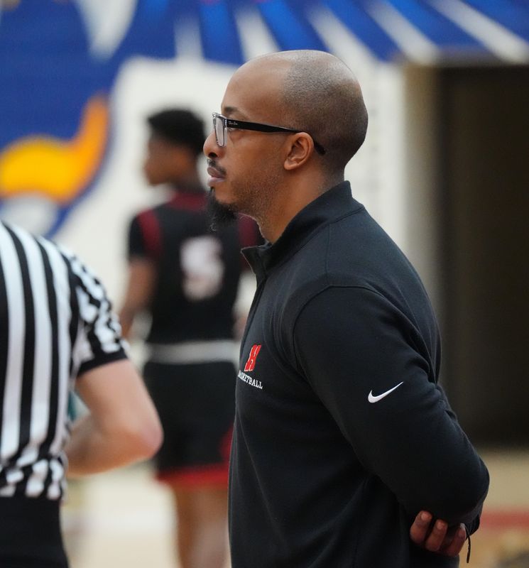Homestead boys basketball head coach Sean Crider follows the action during the game at Slinger High School in Slinger, Wisconsin, Feb. 10, 2026. Slinger won the game, 84-60.