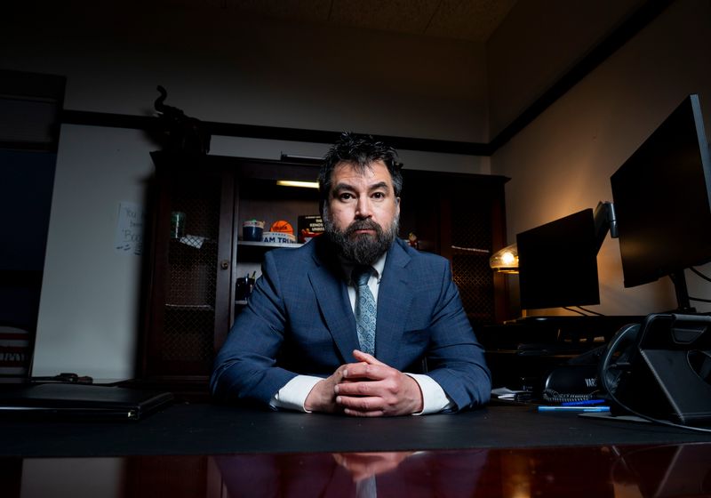 Kenosha County District Attorney Xavier Solis sits in his office in the Molinaro Building on Tuesday, Dec. 23, 2025 in Kenosha, Wisconsin.
