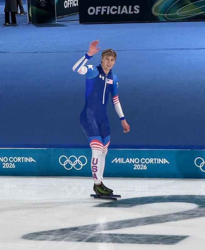 Jordan Stolz waves after competing in the 1,000 meters at the 2026 Milano-Cortina Winter Olympics.