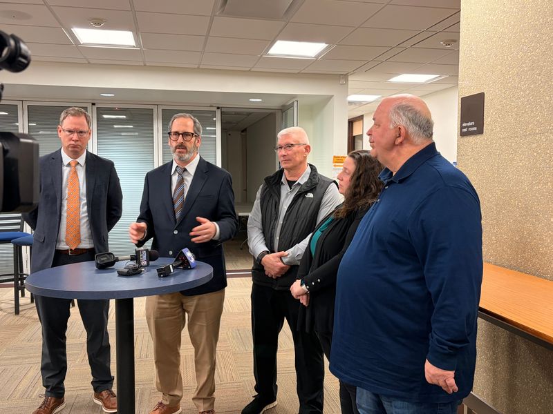 Brown County Executive Troy Streckenbach, second from left, along with County Board Chair Patrick Buckley, continuing to the right, and board members Emily Jacobson and James Pyle, speak to media after the County Board approved an agreement to relocate coal piles Feb. 11.