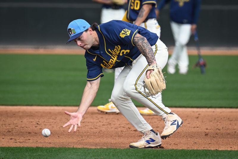 Brewers third base prospect Andrew Fischer fields a ground ball during spring training workouts Sunday, February 15, 2026, at American Family Fields of Phoenix in Phoenix, Arizona.
