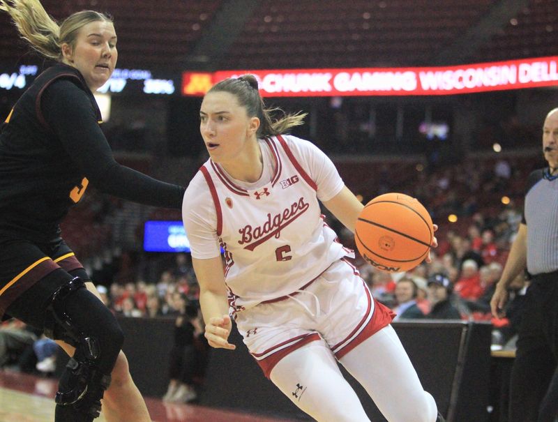 Wisconsin's Dorja Zaja drives to the basket as Minnesota's Sophie Hart defends on Sunday Feb. 15, 2026 at the Kohl Center in Madison, Wis.