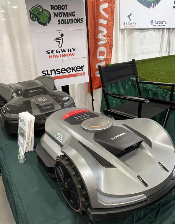 Several models of robotic lawnmowers were on display in the Robot Mowing Solution vendor booth at the Garden & Green Living Expo 2026 in Madison.