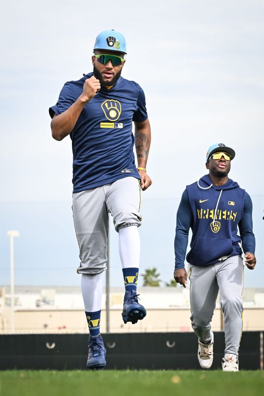 Milwaukee Brewers outfielder Jackson Chourio skips as part of his warmup during spring training workouts Monday, February 16, 2026, at American Family Fields of Phoenix in Phoenix, Arizona.